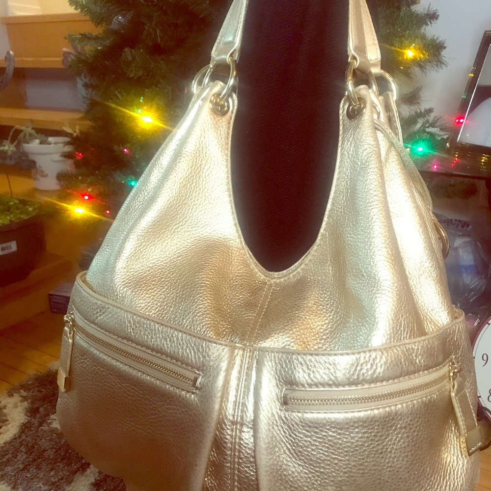 Authentic MK metallic Gold tote bag.